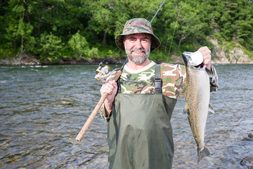 man fishing in Alaska