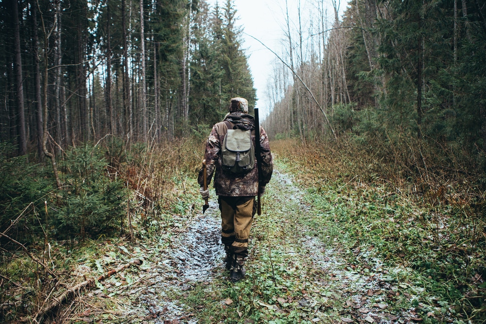 Hunter in the forest experiencing his holiday gift in Alaska